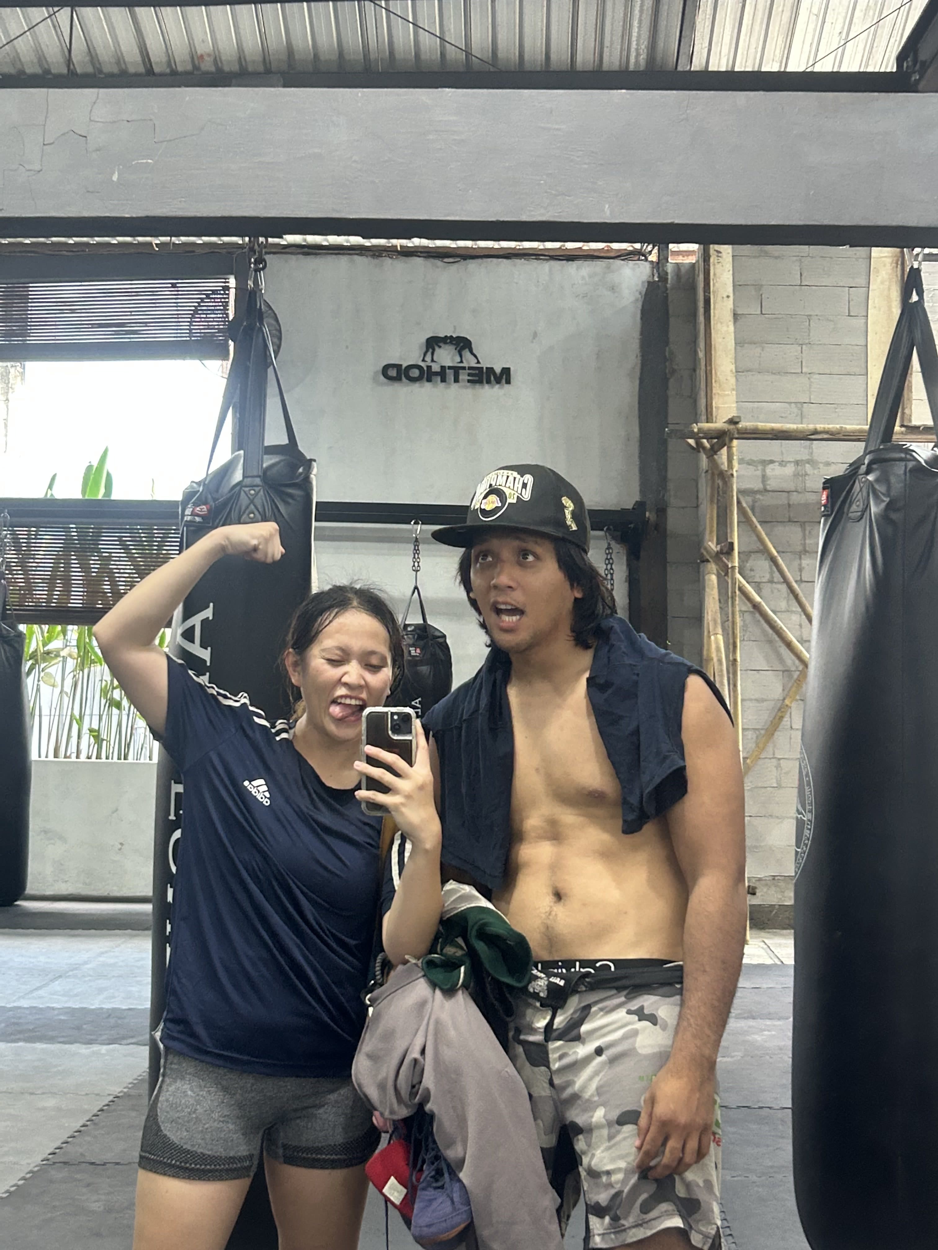 A playful mirror photo after training together